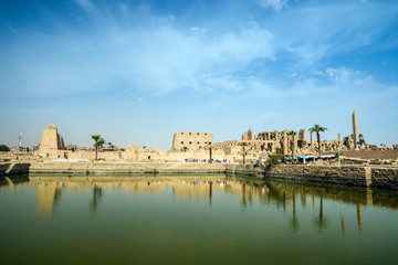 Fototapeta premium The Sacred Lake of Precinct of Amun-Re, Karnak Temple Complex, El-Karnak, Luxor Governorate, Egypt