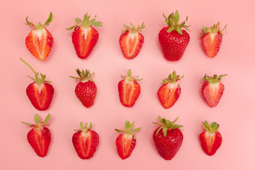 Strawberries on pink background. Fresh organic food concept