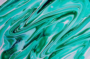 Abstract texture of liquid acrylic. Liquid abstract art. Marble texture of green color.