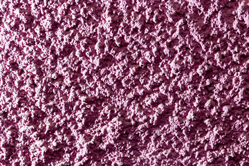 The exterior of the house is painted in pink.