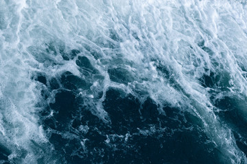 Blue and turquoise water with irregular wave structure