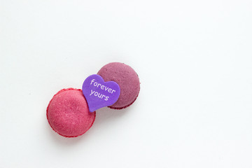 French Pink Macaroons on White Background. Top View Traditional Dessert for Feminine Design. Confectionery, Fashion, Beauty Advertising Template.