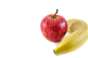 red apple and banana on a white background. Place for text.