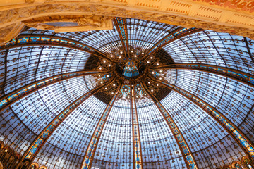 Paris, France - Sept 05, 2019: The glassroof of the Galeries Lafayette interior in Paris. Desinged by The architect Georges Chedanne