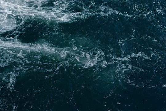 Blue and turquoise water with irregular wave structure