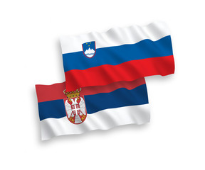 Fototapeta premium Flags of Slovenia and Serbia on a white background