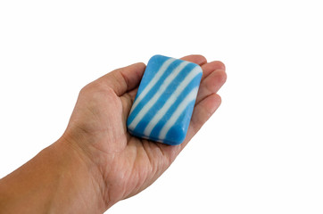 soap in hand, isolated on a white background. Close-up.