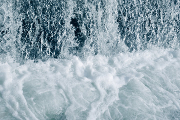 Blue and turquoise water with irregular wave structure