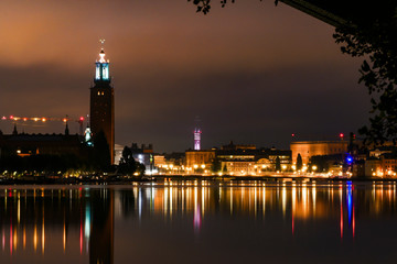 Fototapeta na wymiar Stockholm, Sweden The Stockholm skyline at dawn and the City Hall, or Stadshuset. .