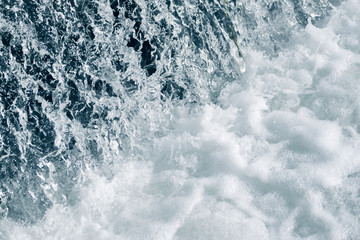 Blue and turquoise water with irregular wave structure