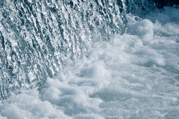 Blue and turquoise water with irregular wave structure