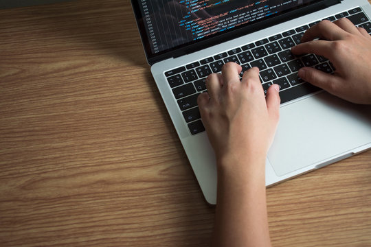Nakhon Ratchasima, Thailand 20 September 2019: Programmers work on laptops at the office. That is programming code.