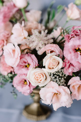 Elegant natural flowers beautifully decorate the table for a solemn reception