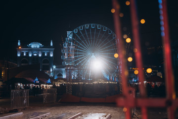 Christmas zone on Kontraktova Square with a Ferris wheel