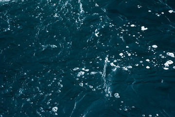 Blue and turquoise water with irregular wave structure