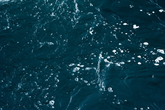 Blue and turquoise water with irregular wave structure