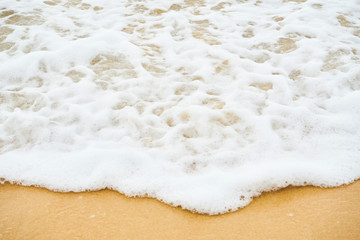 white foam bubble waves on the beach,big wall wave