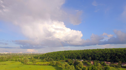 Obraz premium Ponds near a small town with a bird's eye view,Meadows and rates.