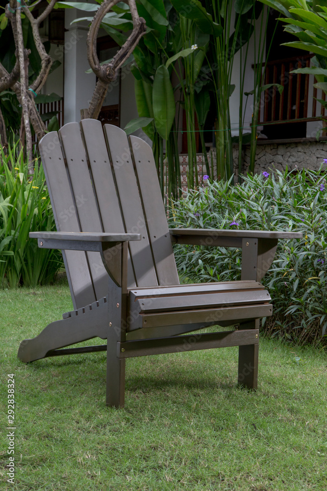 Wall mural the grey wood rocking chair in backyard..