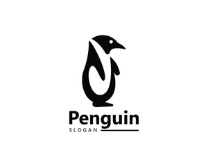 Obraz premium Penguin bird Logo Template vector icon illustration design