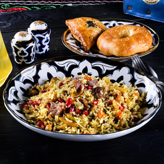traditional pilaf with meat and pomegranate
