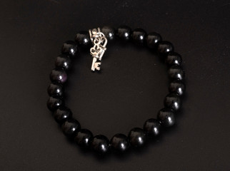obsidian bracelet in studio