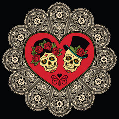 Mexican sugar skulls with heart and lace. Dia de los Muertos.
