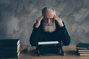 Portrait of his he nice attractive bearded overwhelmed gray-haired professional creative publisher...