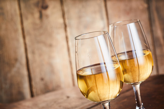 Two glasses of golden Riesling wine