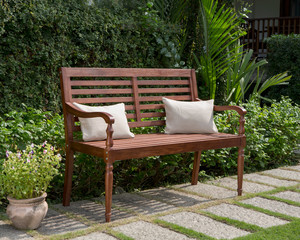 The wood bench in the garden.