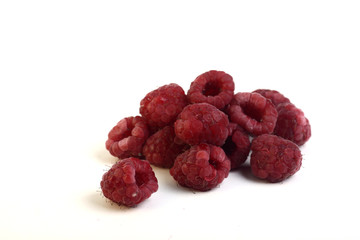 a pile of raspberry isolated on white background
