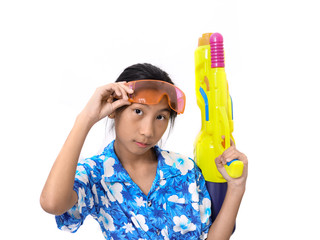 Young Asian girl with water gun on white background, Songkran Festival concept.