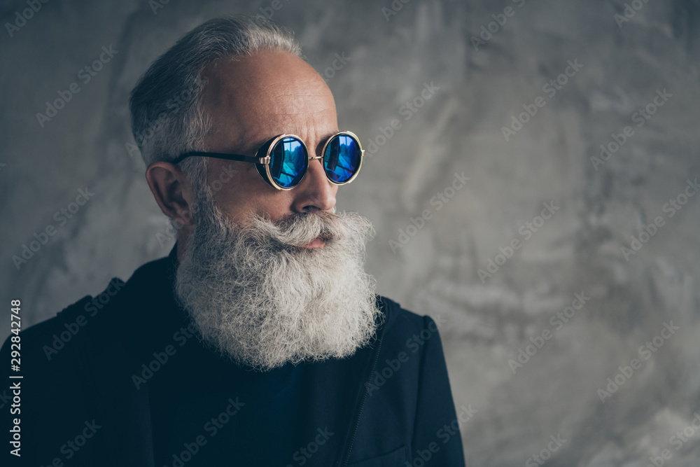 Wall mural close up phoro of concentrated harsh masculine old person in eyewear eyeglasses looking wearing coat