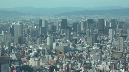 OSAKA, JAPAN - CIRCA SEPTEMBER 2019 : Aerial high angle view of CITYSCAPE of OSAKA in daytime. Osaka is the capital city of Osaka Prefecture and the second largest metropolitan area in Japan.