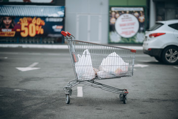 Shopping trolley in the super market in the parking lot © teksomolika