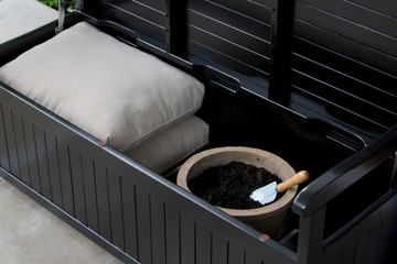 The detail of the storage bench in the backyard.