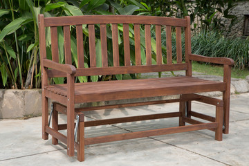 Fototapeta premium The wood bench in the backyard.