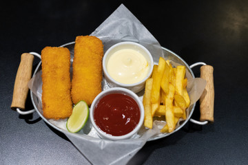 Deep Fried Baked Fish with French Fries Tomato.