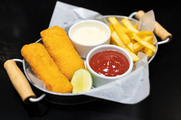 Deep Fried Baked Fish with French Fries Tomato.