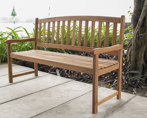 The wood bench in the backyard.