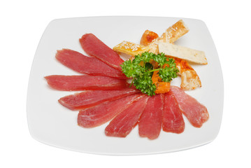 Sliced smoked meat and fried pastry isolated on white background. Dish served with beer