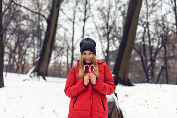 December walk with a young pretty blonde