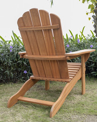 The wood beach chair in the backyard.