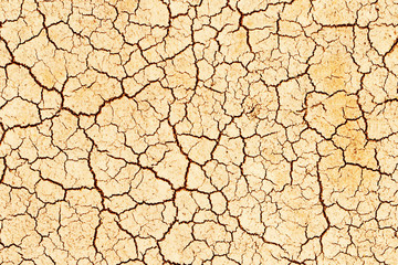 Cracks on the surface of the grung. Hot climat