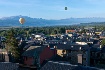 Air balloons on the sky at Llivia, catalonian town
