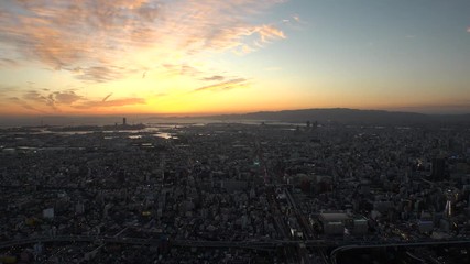 OSAKA, JAPAN - CIRCA SEPTEMBER 2019 : Aerial high angle view of CITYSCAPE of OSAKA in early evening sunset time. Osaka is the second largest metropolitan area in Japan.