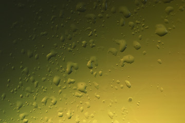 water drops on colored glass