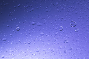 water drops on colored glass