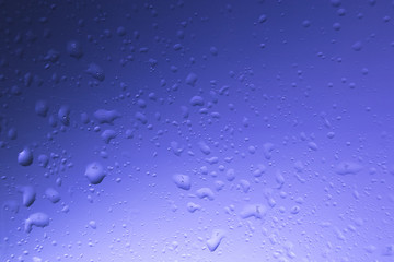 water drops on colored glass