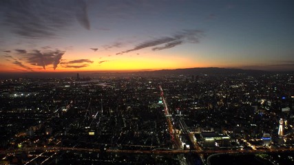 OSAKA, JAPAN - CIRCA SEPTEMBER 2019 : Aerial high angle view of CITYSCAPE of OSAKA in early evening sunset time. Osaka is the second largest metropolitan area in Japan.